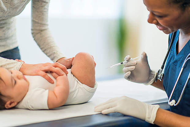 A baby receiving vaccination.